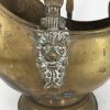 Victorian brass lion headed coal scuttle with blue delft handles