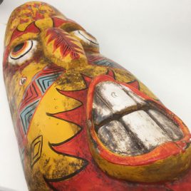 Yellow headed fairground / theatrical carved wooden mask with 2 faces